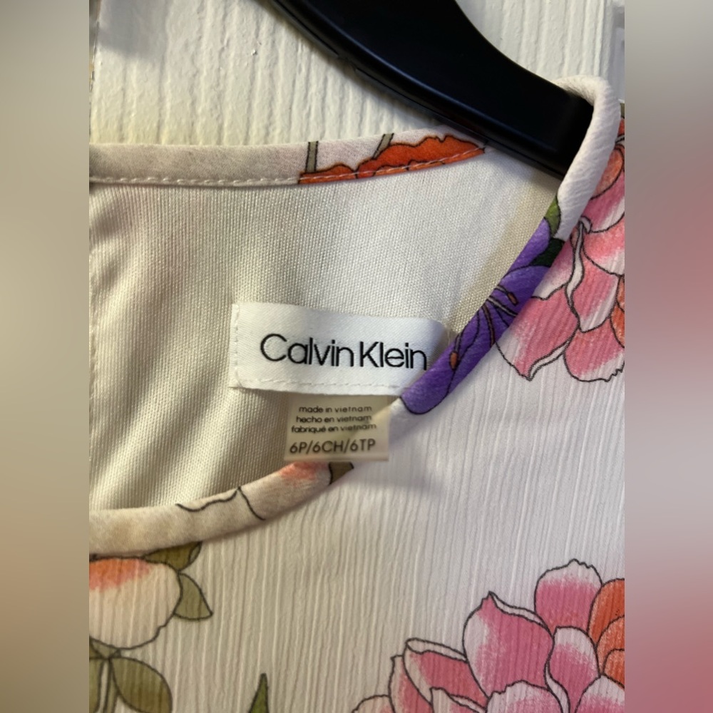 A floral dress is a lovely and feminine choice, perfect for various occasions.